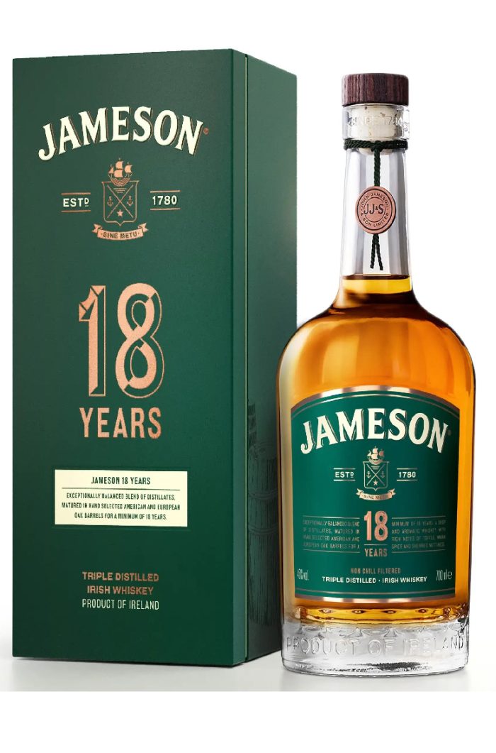 Jameson 18 Year Old Irish Whiskey is a premium spirit that is crafted by the world-renowned Jameson Distillery. This exquisite whiskey is matured for a minimum of 18 years in oak casks, which imparts a rich and complex flavor profile to the spirit. The nose of this whiskey is filled with notes of dried fruit, caramel, and vanilla, while the palate offers a smooth and creamy taste with hints of sherry and spice. The finish is long and lingering, leaving a warm and satisfying feeling that is perfect for sipping on cold evenings. Jameson 18 Year Old Irish Whiskey is a perfect example of the mastery and craftsmanship that goes into making a premium Irish whiskey. It is best enjoyed neat or on the rocks, allowing you to savor the full range of flavors and aromas that this whiskey offers. This whiskey has won several awards, including a Double Gold Medal at the San Francisco World Spirits Competition. It is perfect for special occasions or as a gift to someone who appreciates the finer things in life. In conclusion, Jameson 18 Year Old Irish Whiskey is a true masterpiece that stands out as one of the finest examples of Irish whiskey. Its rich and complex flavor profile, combined with its superior quality, make it a must-try for any whiskey enthusiast. So, treat yourself to a bottle of Jameson 18 Year Old Irish Whiskey today and experience the taste of true luxury.